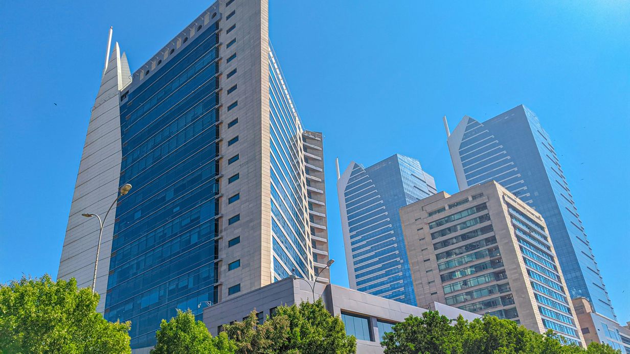 Towers in Karachi's financial district, where AKS iQ was deployed across a national banking sector
